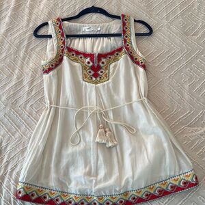 Lovely sleeveless embroidered top.